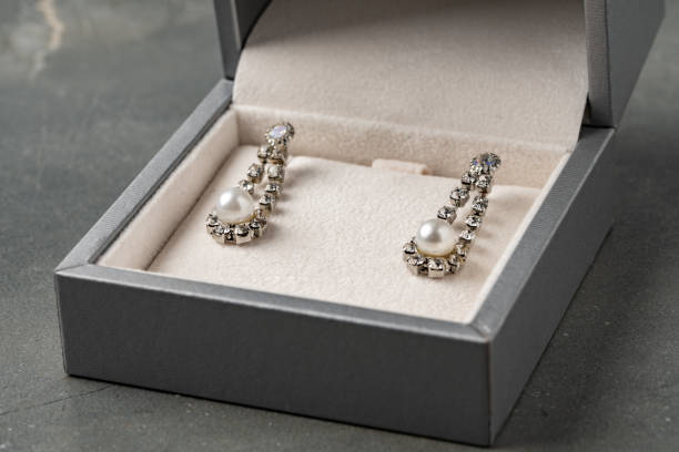 istock Jewelry box with earrings on a gray background 1499949412