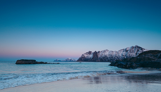 Sunset over Hovden beach at the Vesteralen archipel in Northern Norway during winter
