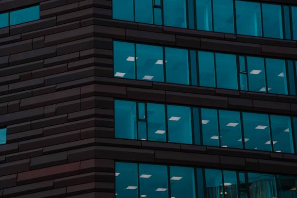 istock Low angle shot of a modern office building in the daylight 1499950809