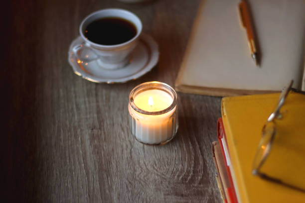 istock Books, Glasses, E-Reader, Pen, Tea, Cookies and Candles 1499951664