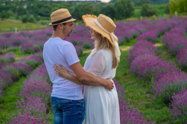 istock loving couple in lavender field. Selective focus. 1499953000