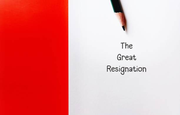 istock Paper on copy space red background with pencil writing text THE GREAT RESIGNATION, refers to the record number of employees leave their jobs from pandemic beginning to search for work life balance 1499955845