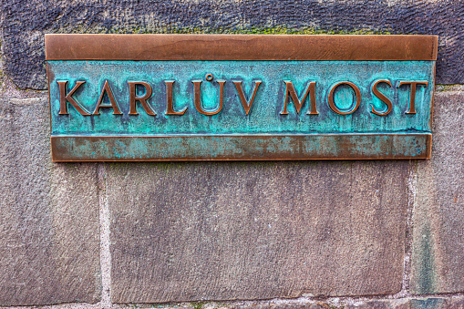 Karluv Most inscription bronze emblem . Charles Bridge in Prague