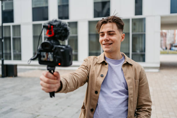 istock Young Man Recording Vlog In The City 1499957085