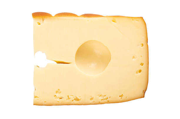Smoked semi-hard cheese with large holes. Aromatic, yellow Traunstein cheese of smooth texture from Upper Austria, made of cow milk, and beechwood smoked. Isolated, from above, over white, food photo.
