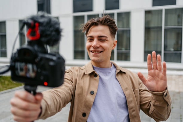 istock Young Man Recording Vlog In The City 1499957526
