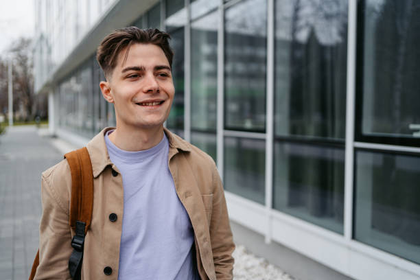 istock Young Man Walking Down The Street 1499957823