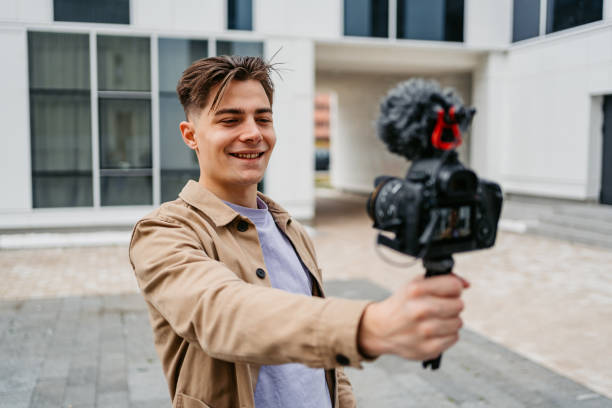 istock Young Man Recording Vlog In The City 1499958005