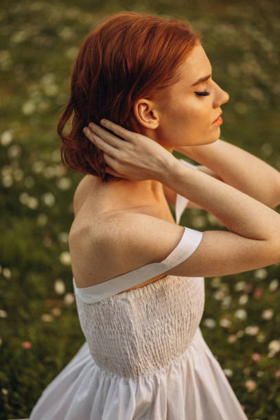 istock Smiling young woman enjoying summer 1499960624