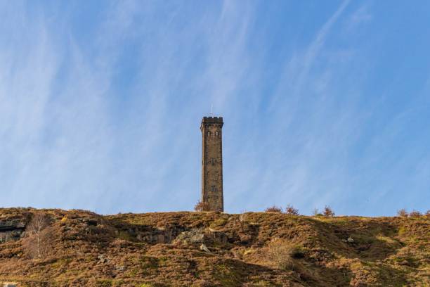 istock an old stone tower on top of a hill 1499963137