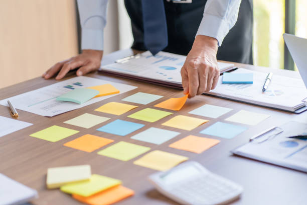 istock Business People brainstorming Meeting Design Ideas use post it notes to share idea professional investor start up project business brainstorming planning in office 1499965326