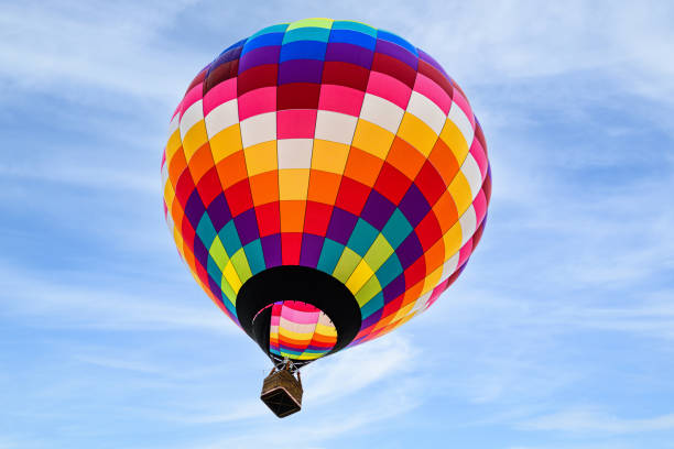 istock Hot air balloon flight over blue sky 1499966368