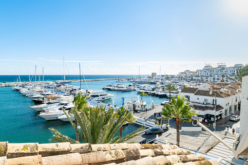 Views from a rooftop apartment overlooking the luxury Mediterranean port of Puerto Banus