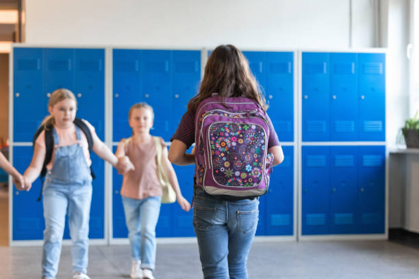 istock School girls  in the school corridor 1499972546