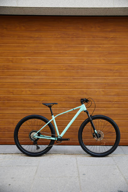 istock mtb bike leaning against the wall 1499976277