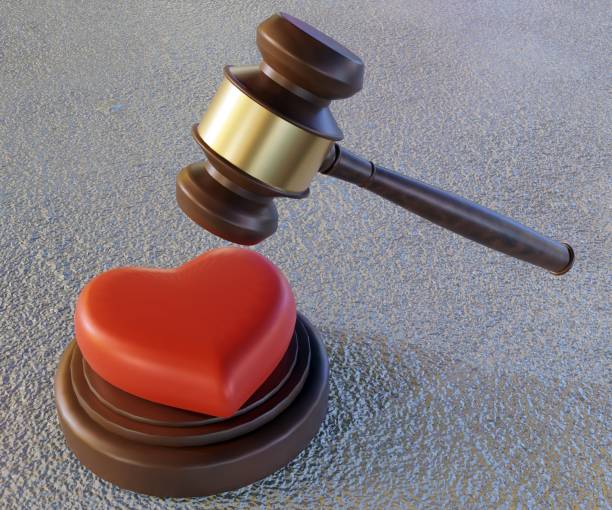 istock A gavel and red heart shape in the background 1499977950
