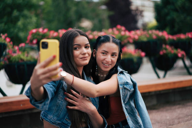 istock Two girls taking selfie 1499991974
