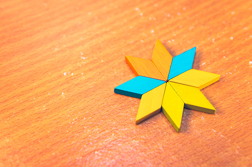 Tangram puzzle star shape use for education and creative concept