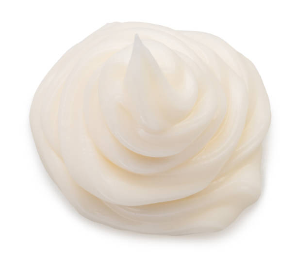 istock Mayonnaise sauce stain close up on white background. File contains clipping path. 1500005751