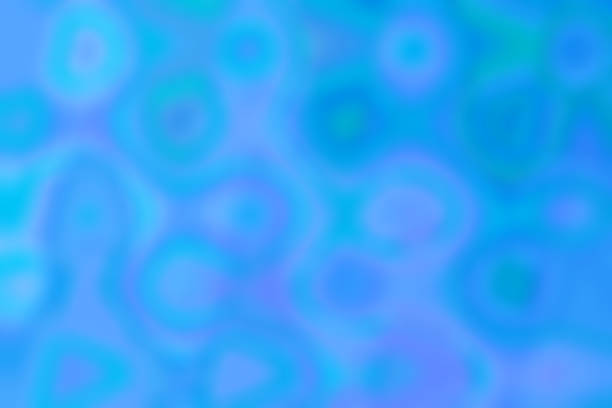 ふわふわしたぼかした青緑と紫の不規則な泡模様のテクスチャ背景。