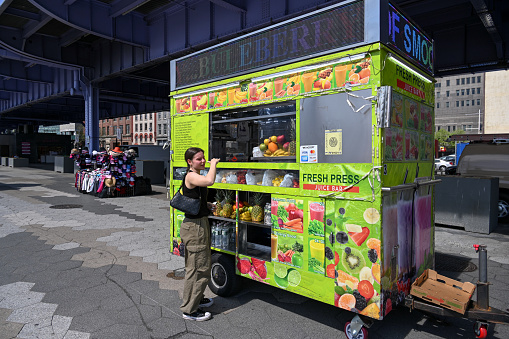 New York, USA, April 14, 2023 - Juice Bar underneath FDR Drive at the South Street Viaduct in Manhattan, New York City.