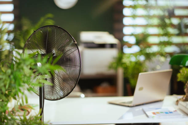 metal ventilator in modern green office stock photo