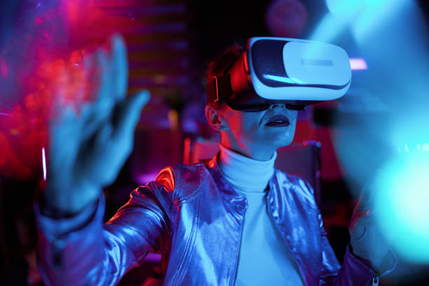 istock trendy 40 years old woman exploring metaverse in office 1500016763