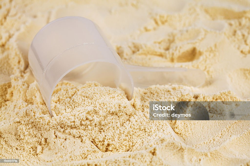 Cucchiaio di proteine di siero del latte vaniglia isolato - Foto stock royalty-free di Bevanda proteica
