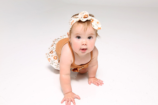 Beautiful baby girl on white background