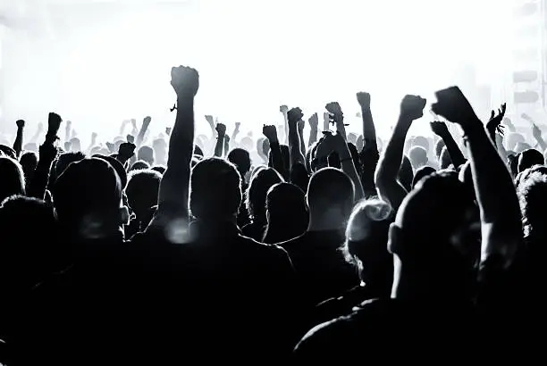 Photo of Silhouette of a crowd of people at a rock concert