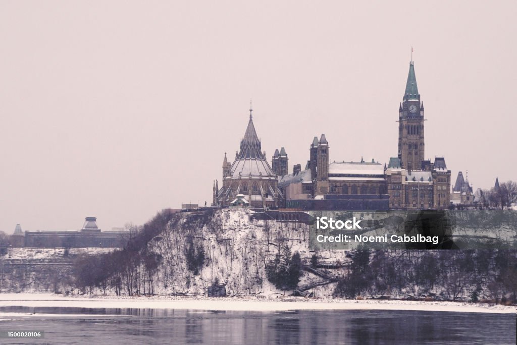 Parliament of Canada and Library of Parliament Parliament of Canada and Library of Parliament during winter Architecture Stock Photo