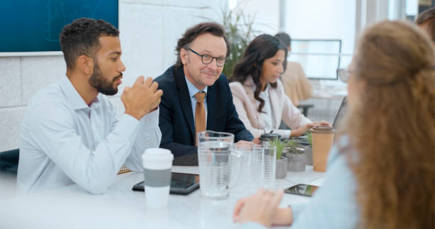 istock Business people talking in boardroom 1500021596