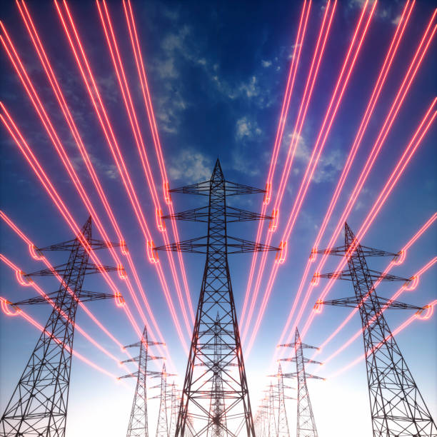 башни передачи электроэнергии с красными светящимися проводами - steel cable power bright technology стоковые фото и изображения