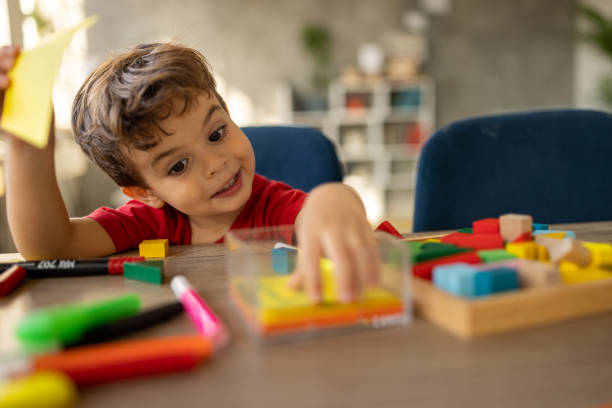 istock Little boy playing at home 1500022155