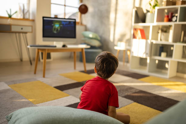 istock Little boy watching cartoon 1500023895