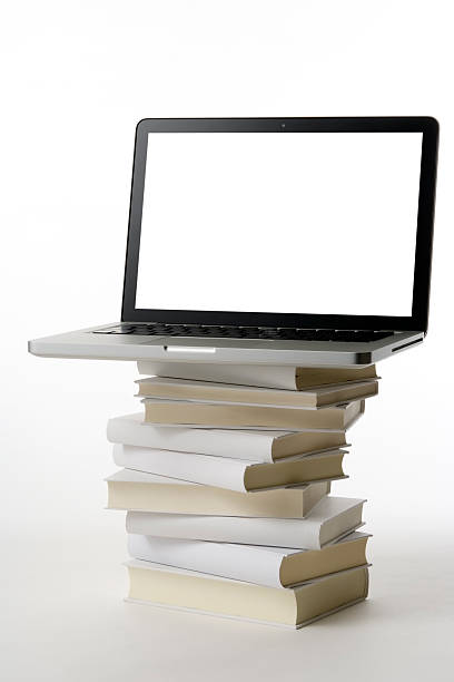 istock Laptop on the stacked blank books on white background 150002415