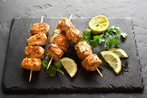 istock Salmon skewers on slate board 1500024807