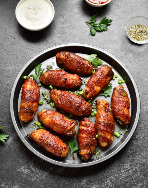 istock Bacon wrapped grilled chicken wings 1500024889