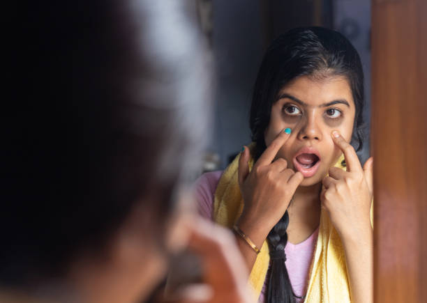 istock Woman in front of mirror 1500026464