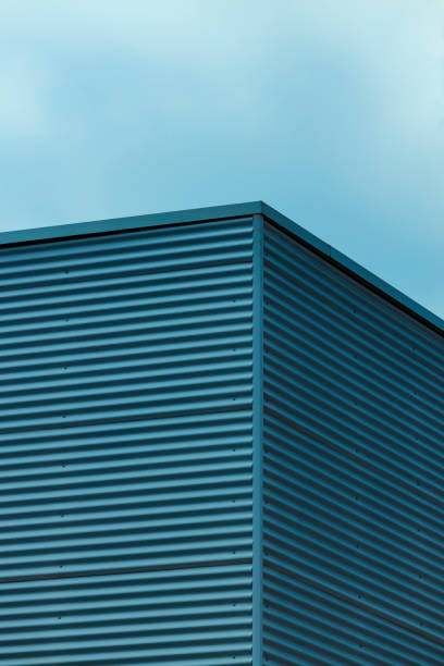 istock architectural abstracts: yellow metalic facade 1500030578