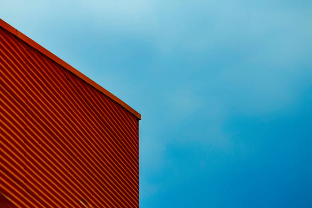 istock architectural abstracts: yellow metalic facade 1500030912