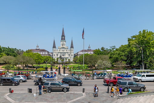 New Orleans, USA. 9 June 2023. Cars in front of St. Louis Cathedral in central New Orleans