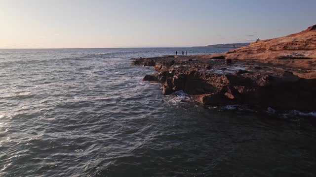 Moving shot of south California ocean and cliff natural landscape from drone
