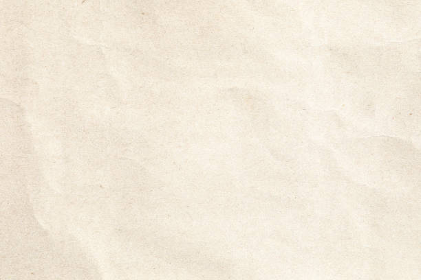 istock Soft brown crumpled parchment paper texture 1500033526