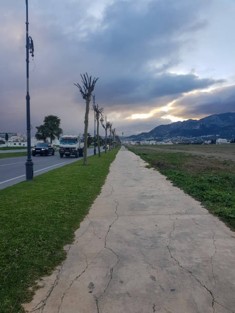 istock Sidewalk from the city side on a cloudy day 1500034906