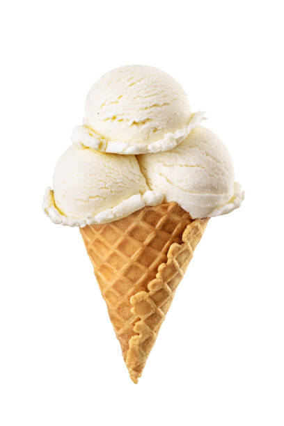 istock Three vanilla ice cream scoops served on a waffle cone isolated on white 1500035727