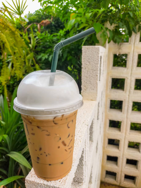 The Thai tea on the table is a delightful and refreshing beverage that captures the unique flavors of Thailand. Its vibrant orange color and creamy texture make it an irresistible treat. on Thai tea .