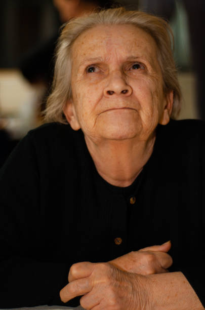 istock mature woman sitting looking away 1500045678