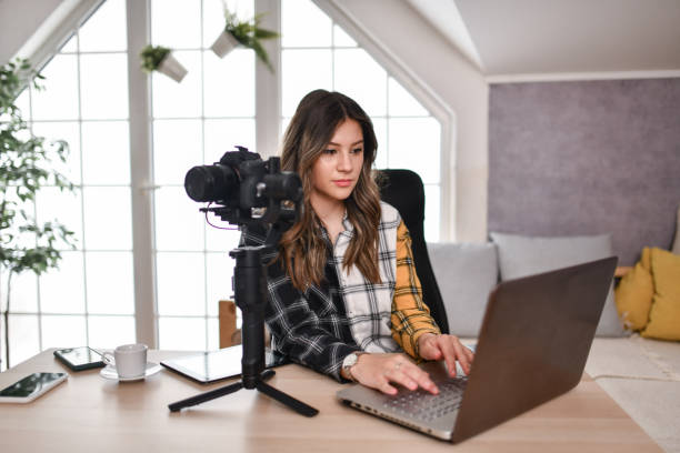 istock Focused Female Graphic Designer Working On New Images Transferred From Camera 1500049373