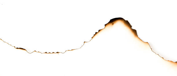 istock burnt paper on a white background 1500052671